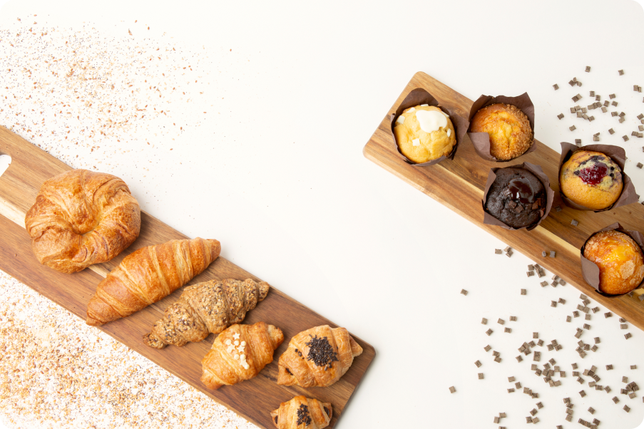 assortment of croissants and muffins